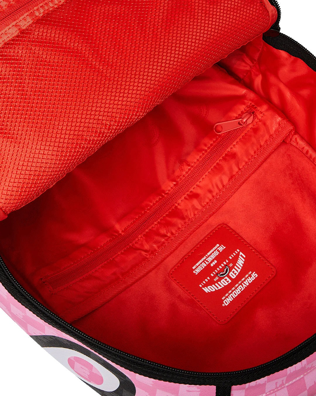 PINK AND BLACK DRIP CHECK DLXSV BACKPACK